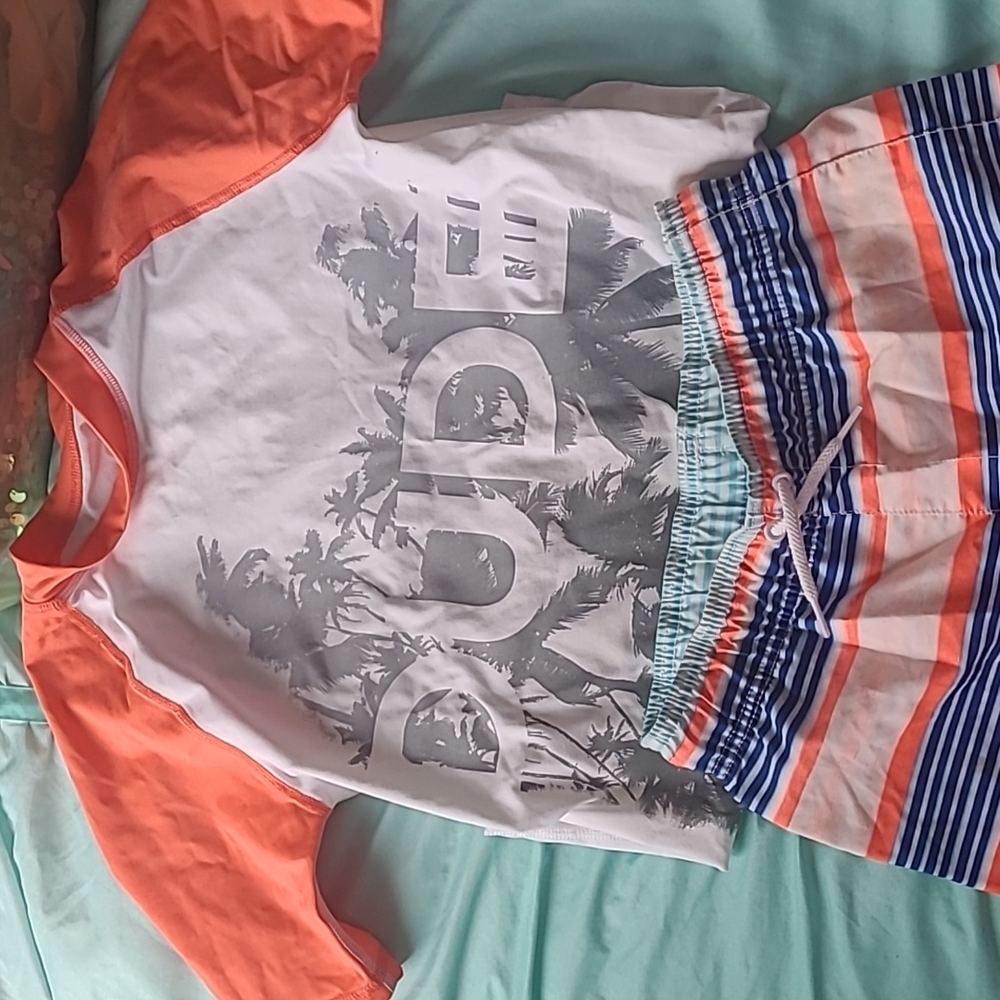 Boys swim combo. Place sport brand. Top is 14,and bottoms are 10/12